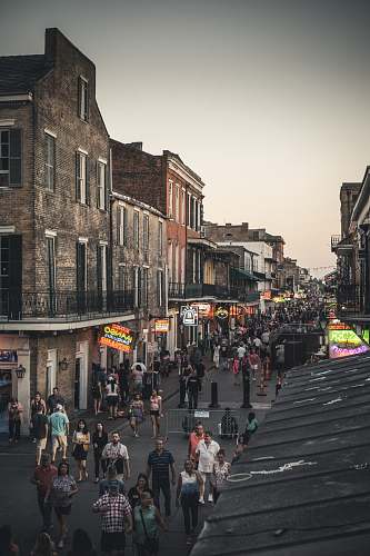 new orleans people walking on street during day time street
